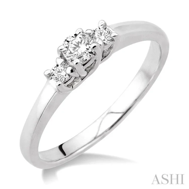 1/4 Ctw Three Stone Round Cut Diamond Ring in 14K White Gold