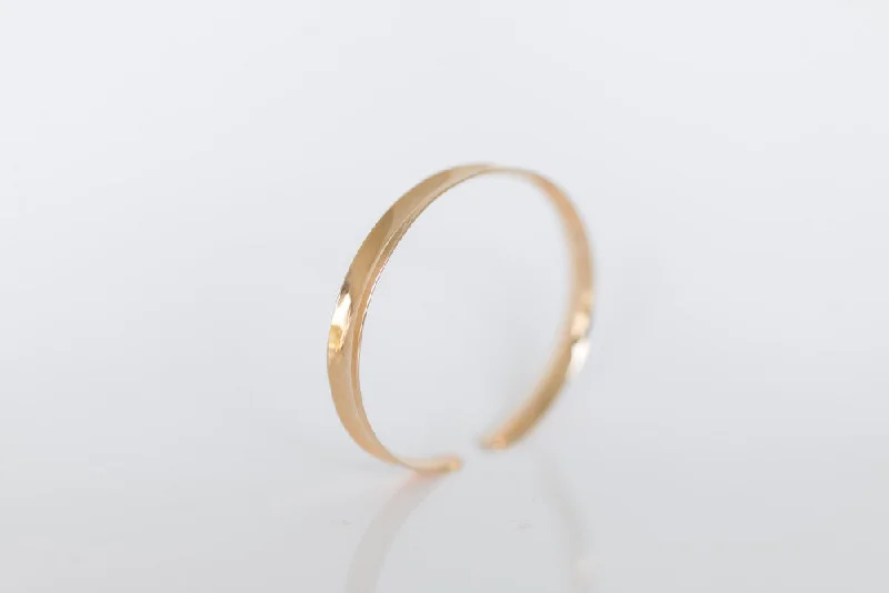 Channel: Gold Anticlastic Bracelet Narrow